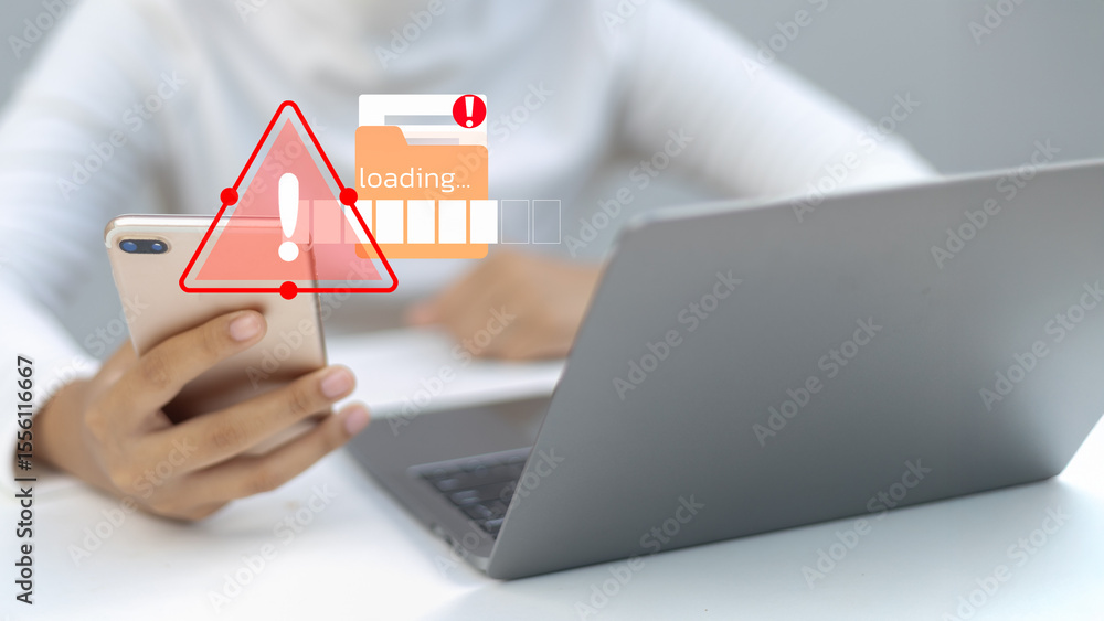Aufkleber close-up of a person holding a smartphone with a red warning triangle and file loading error icon, s