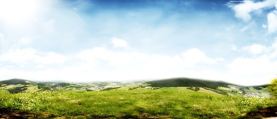 Rolling green hills under a bright sky