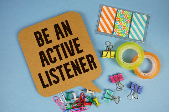 Be An Active Listener text with stationery on blue background