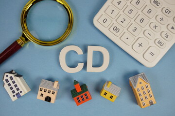 CD abbreviation of Closing Disclosure alphabet letters with house model, magnifying glass and...