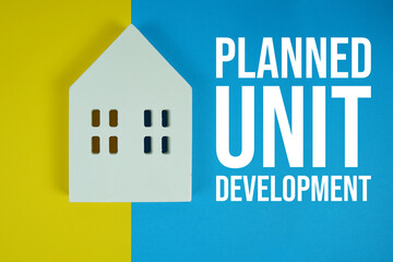 PUD Planned Unit Development text with house models on blue background