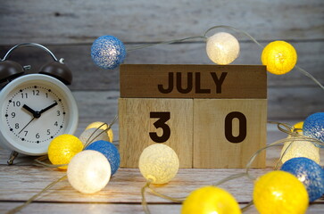 Wooden Calendar Showing the Date of July 30th. Day 30 of July month
