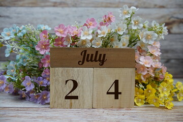 Wooden Calendar Showing the Date of July 24th. Day 24 of July month