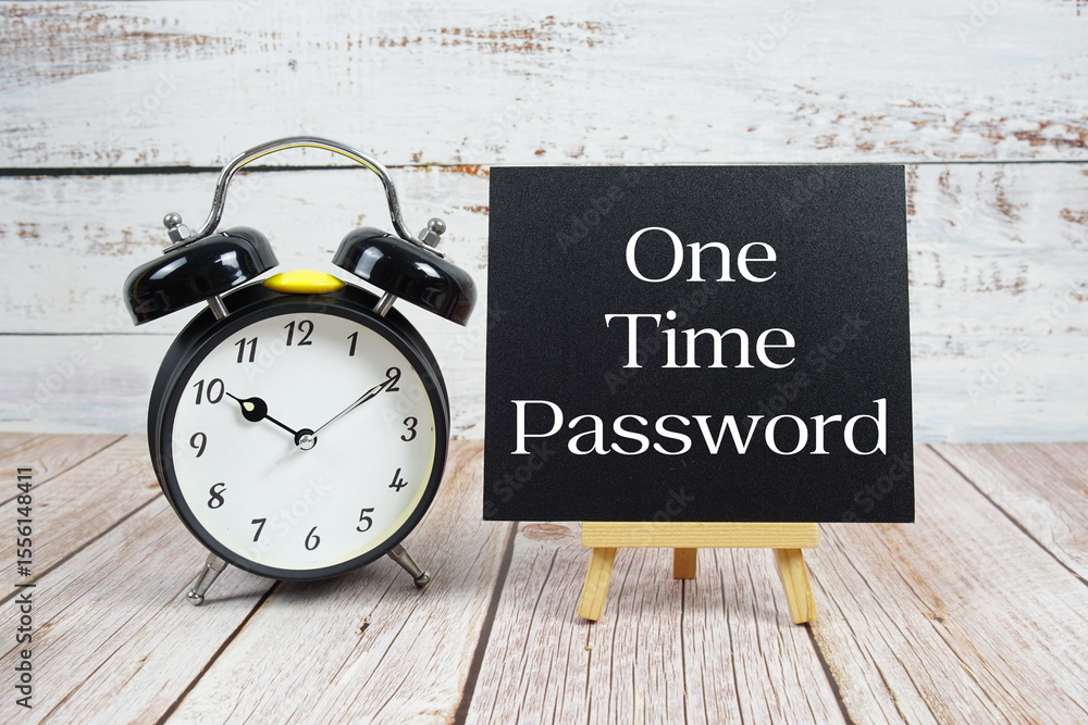 Aufkleber one time password text with easel and alarm clock on wooden background