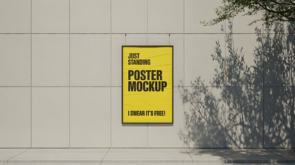 Yellow poster mockup on a tiled wall with tree shadows creating an outdoor advertising scene view