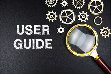 User Guide text message with magnifying glass on black background