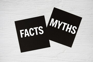 Facts vs Myths text message on stick note on concrete background