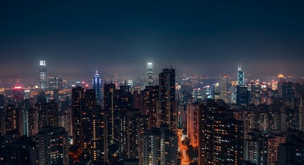 Obraz premium Night cityscape featuring numerous skyscrapers with illuminated windows under a dark sky