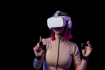 Woman in VR headset interacting with virtual interface