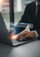 Online Search: Businessman using laptop with search bar interface.