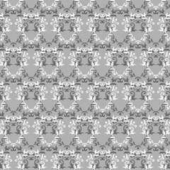Ornament on a gray background.Vector seamless pattern with two-color beautiful ornament on a gray background.
