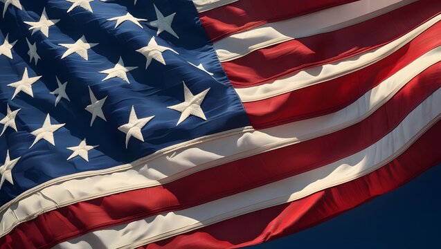 American Flag in the Wind: A detailed capture of the American flag, showcasing its iconic stars and stripes billowing gently in the breeze, symbolizing patriotism and national pride.