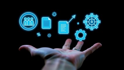 Human hand presenting glowing blue digital icons representing business concepts on a dark background
