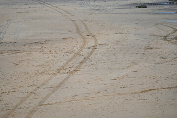 tire tracks in sand