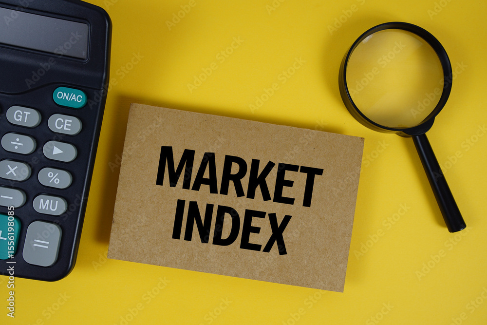 Fototapete market index text with magnifying glass anc calculator on yellow background