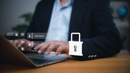 Businessman login information on laptop with cybersecurity and data privacy concept. Secure password protection, online identity verification, network safety for personal and business digital security