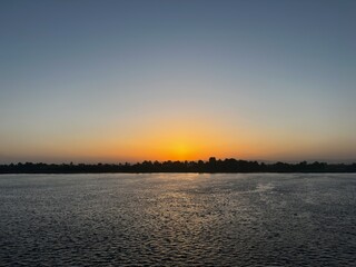 Naklejka premium sunset on the river