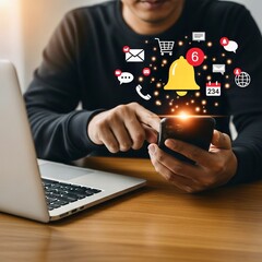 A person holds a phone, surrounded by floating icons like emails, shopping carts, and a prominent notification bell, suggesting a busy digital life.
