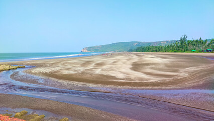 beautiful landscape scenery at harihareshwar beach in maharashtra in india.
