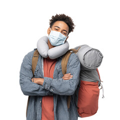 Young traveler with surgical mask neck pillow and travel bag smiling isolated on transparent background (4)