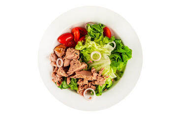Tuna salad green leaf lettuce, canned tuna, tomato fresh delicious gourmet food background on the table rustic food top view copy space keto and paleo diet vegetarian food pescetarian diet