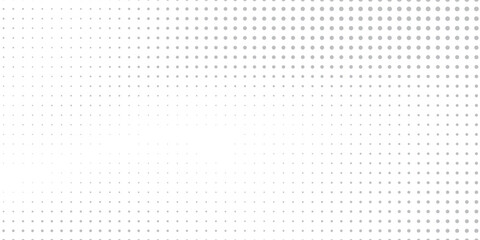Abstract silver halftone gradient texture. Vanishing polka dot background. Repeating dots gradation pattern modern
