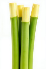 Obraz premium Lush Green Bamboo Stalks Close up View of Fresh Cut Bamboo Shoots Isolated on White Background