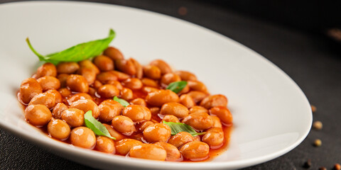 Bean stew tomato sauce cranberry beans vegetable dish beans borlotti fresh delicious gourmet food background on the table rustic food top view copy space keto and paleo diet vegan and vegan food