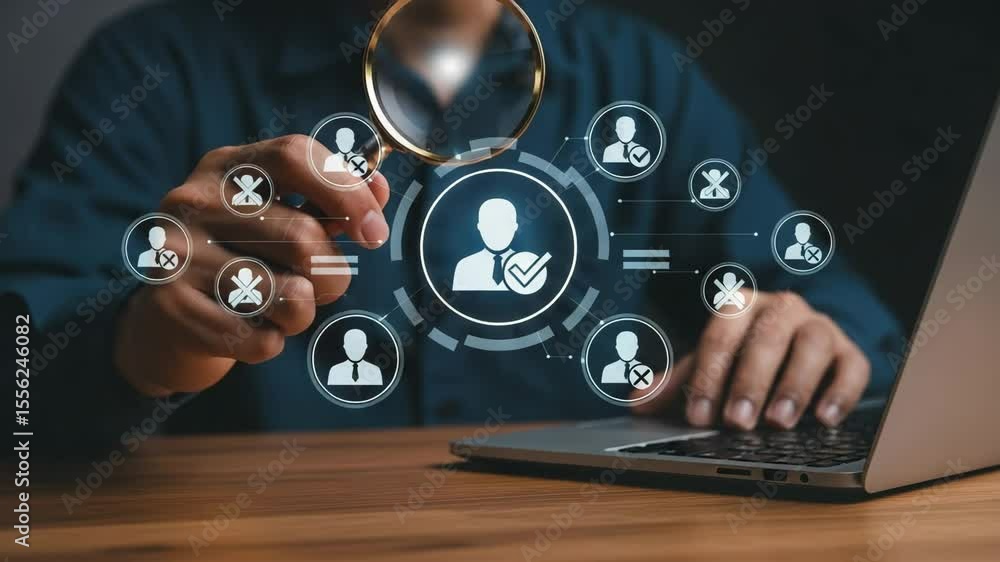 Poster Person using laptop with digital interface showing profile icons and checkmarks on a wood table