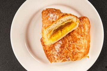 Triangle cake almond puff pastry sweet dessert fresh delicious gourmet food background on the table rustic food top view copy space