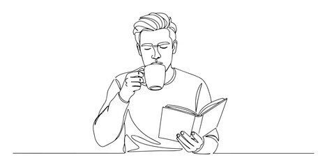 man drinking coffee and reading book