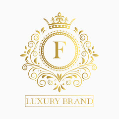 Luxurious and elegant logo design with a stylized letter F in gold featuring regal floral embellishments