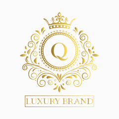Luxurious and elegant logo design with a stylized letter Q in gold featuring regal floral embellishments