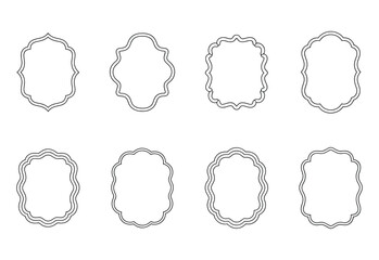 Collection of eight decorative ornate empty frames with scalloped edges on white background
