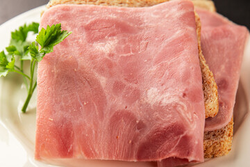 Sandwich ham slices meat spam pork fresh delicious gourmet food background on the table rustic food top view copy space