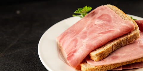 Sandwich ham slices meat spam pork fresh delicious gourmet food background on the table rustic food top view copy space