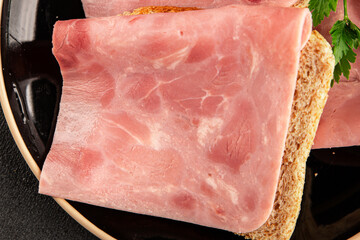 Sandwich ham slices meat spam pork fresh delicious gourmet food background on the table rustic food...