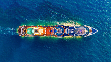 Aerial top view cruise ship in the middle of the ocea.