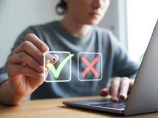 Focused Young Man Making Important Decisions, Choosing Between Right and Wrong, Success and Failure, Yes or No, Using Digital Checkmarks on Laptop