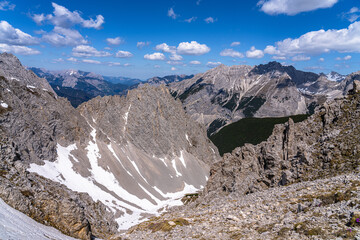 Stunning view of massif of Tyrolean Alps massif from top of Hafelekarspitze peak in spring on a sunny day with blue sky, Innsbruck, Tyrol, Austria