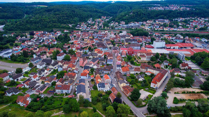 Aerial panorama view around the old town of Treuchtlingen on an overcast summer day in Germany.