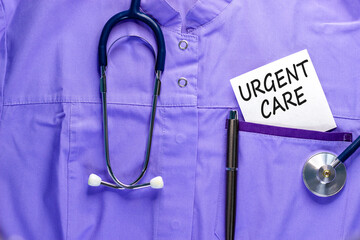 Urgent care symbol. Concept words Urgent care on beautiful white card. Stethoscope and pen. Beautiful medical uniform. Medical healthy lifestyle urgent care concept.