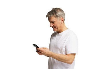 Middle-aged man engaging with smartphone, showcasing modern communication in personal without a...