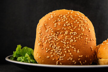 Bun burger puffy soft buns baking fresh delicious gourmet food background on the table rustic food...