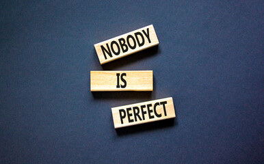 Nobody is perfect symbol. Concept words Nobody is perfect on beautiful wooden block. Beautiful...