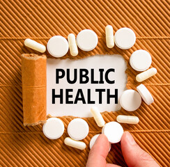 Public health symbol. Concept words Public health on beautiful white paper. White pills tablets....