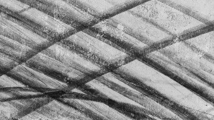 Aerial view car tire marks abstract street road background with black tire marks on race track, Texture and background car automobile and automotive skid tire marks.