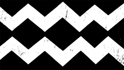 Fototapeta premium A black and white chevron patterned background. Black and white zigzag pattern, perfect for adding a touch of simplicity and style to any project or design,