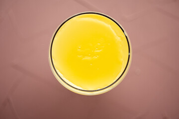 banana  pudding in glass mug on wooden table close up	