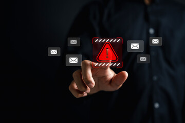 Email spam alert with cybersecurity threat warning symbol.